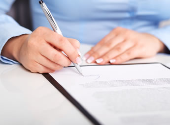 Person writing a letter